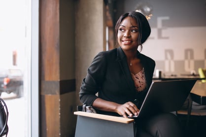 african-american-business-woman-working-computer-bar