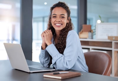 i-love-what-i-cropped-portrait-attractive-young-businesswoman-working-her-laptop-while-sitting-office