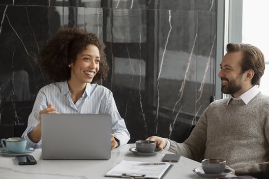 medium-shot-smiley-people-talking-work